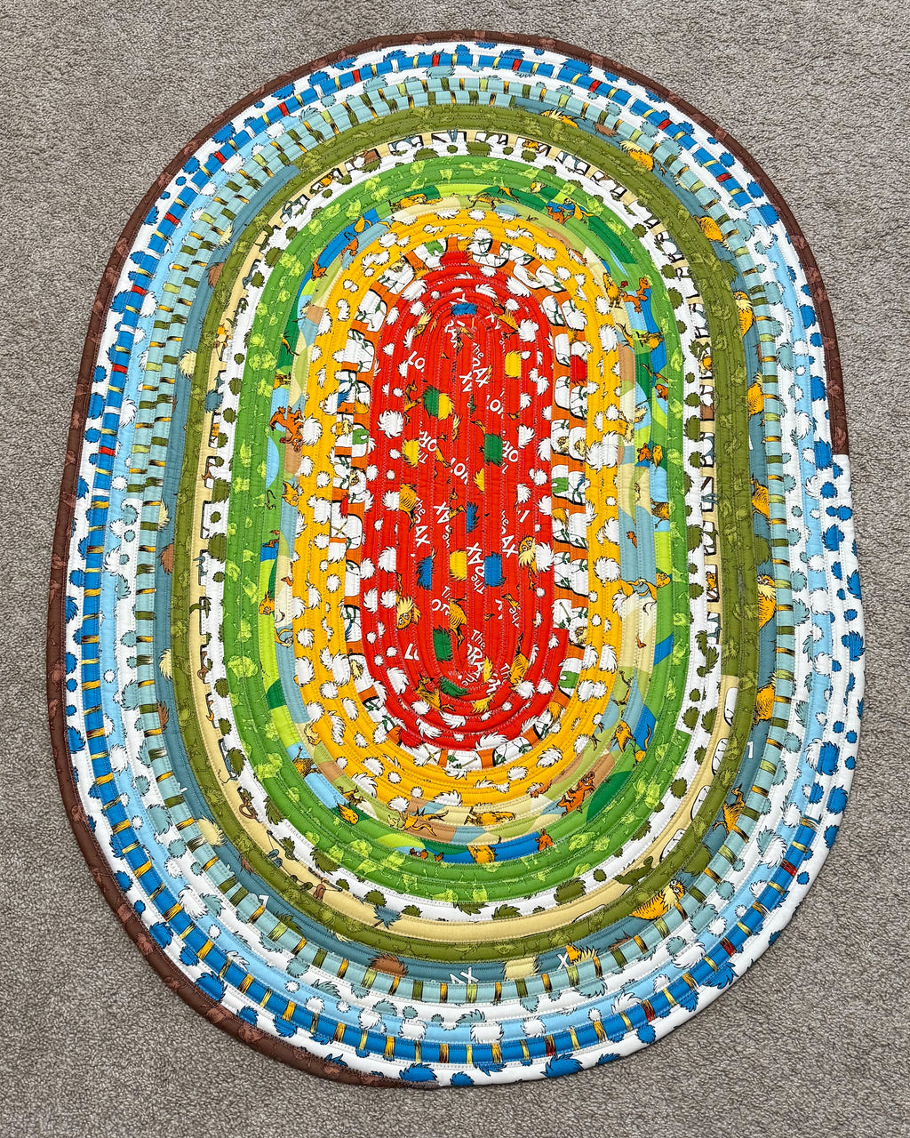 Lorax-style Jelly Roll Rug handmade quilted cotton accent rug