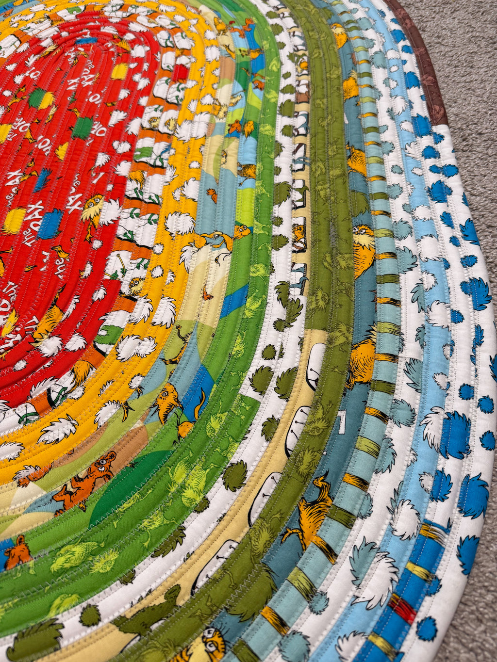 Lorax-style Jelly Roll Rug handmade quilted cotton accent rug